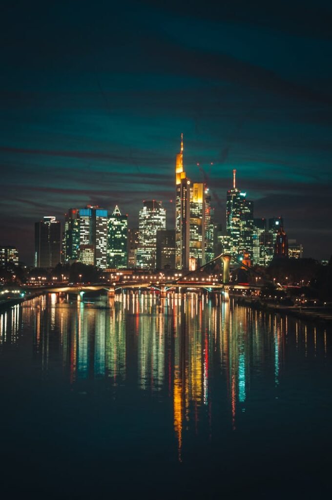Photo of City Buildings During Night